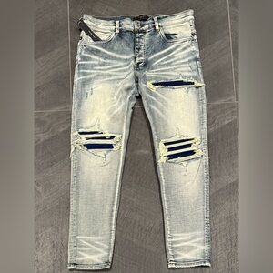 AMIRI Light Blue Distressed Skinny Jeans